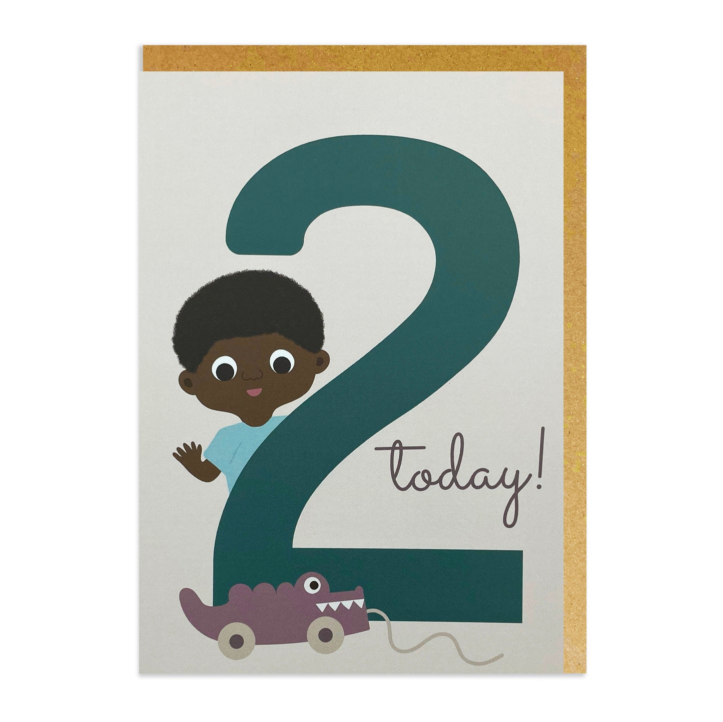 A Black birthday card featuring a two-year-old boy of Black or mixed-race heritage holding a number two and a playful crocodile toy beside him.