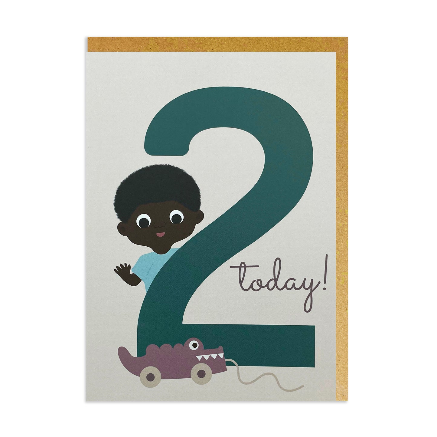 A Black birthday card featuring a two-year-old boy of Black or mixed-race heritage holding a number two and a playful crocodile toy beside him.