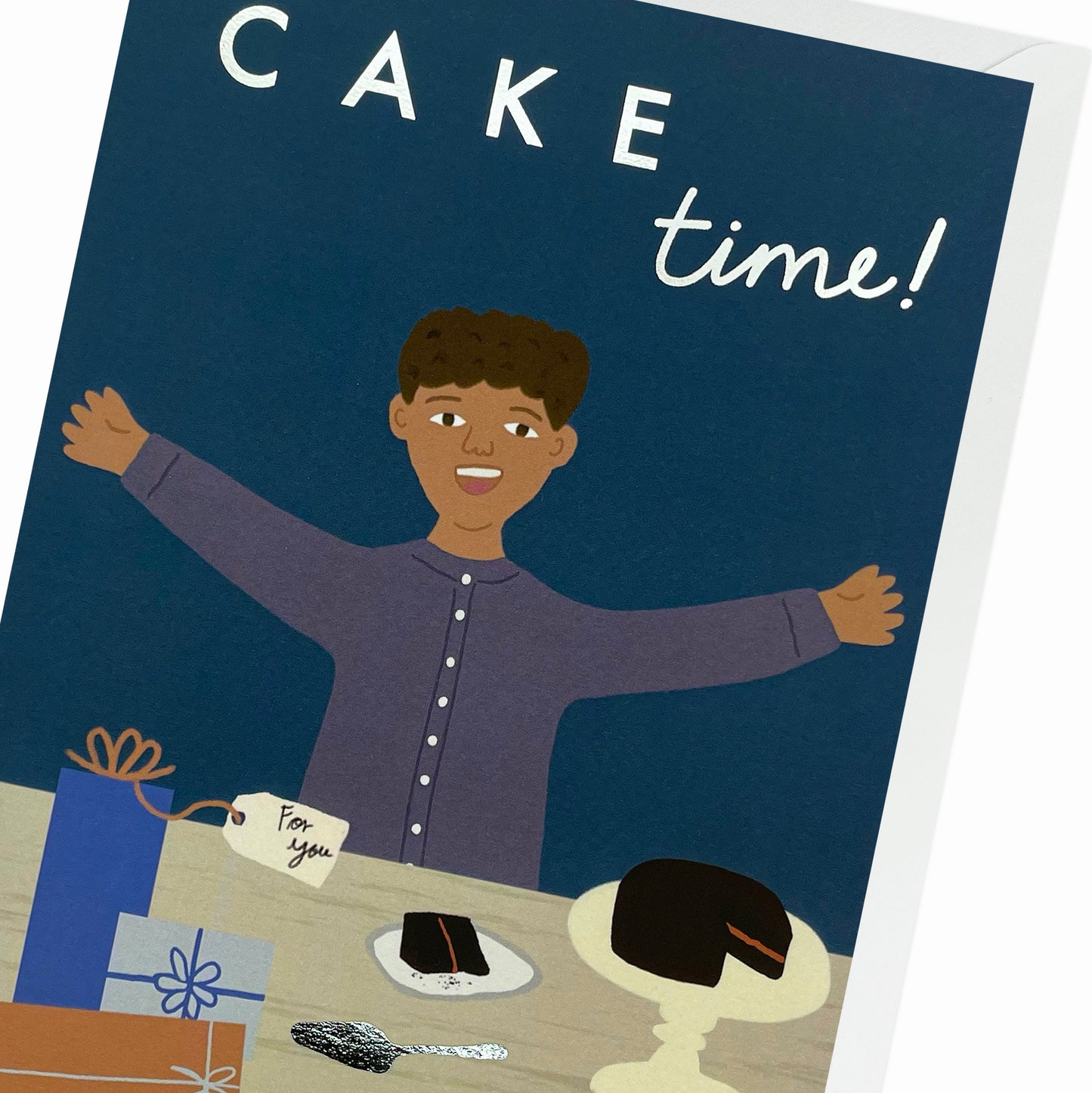 Close up of Black and Mixed race man, enjoying birthday cake & presents. Black Birthday Card