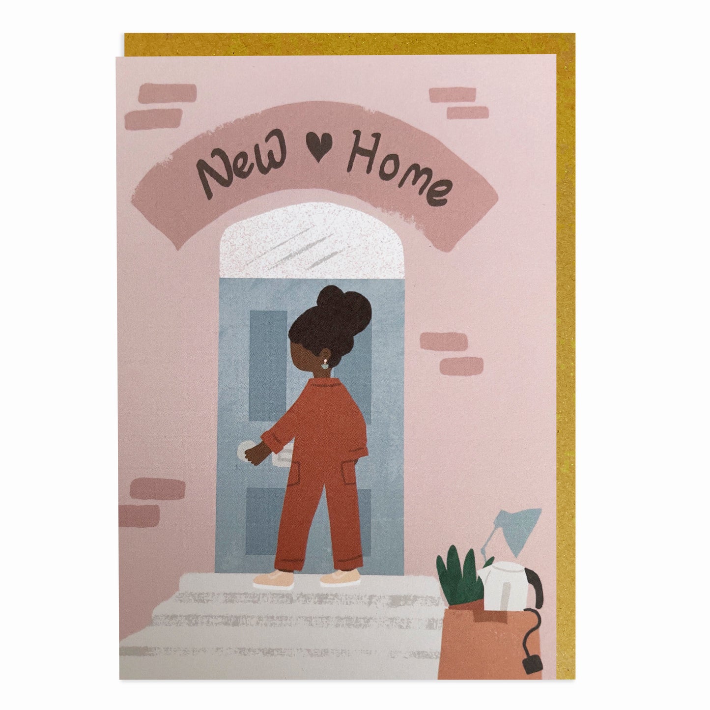 A black greeting card features a woman of black or mixed race, mixed heritage standing at the door of a house, celebrating a new home.