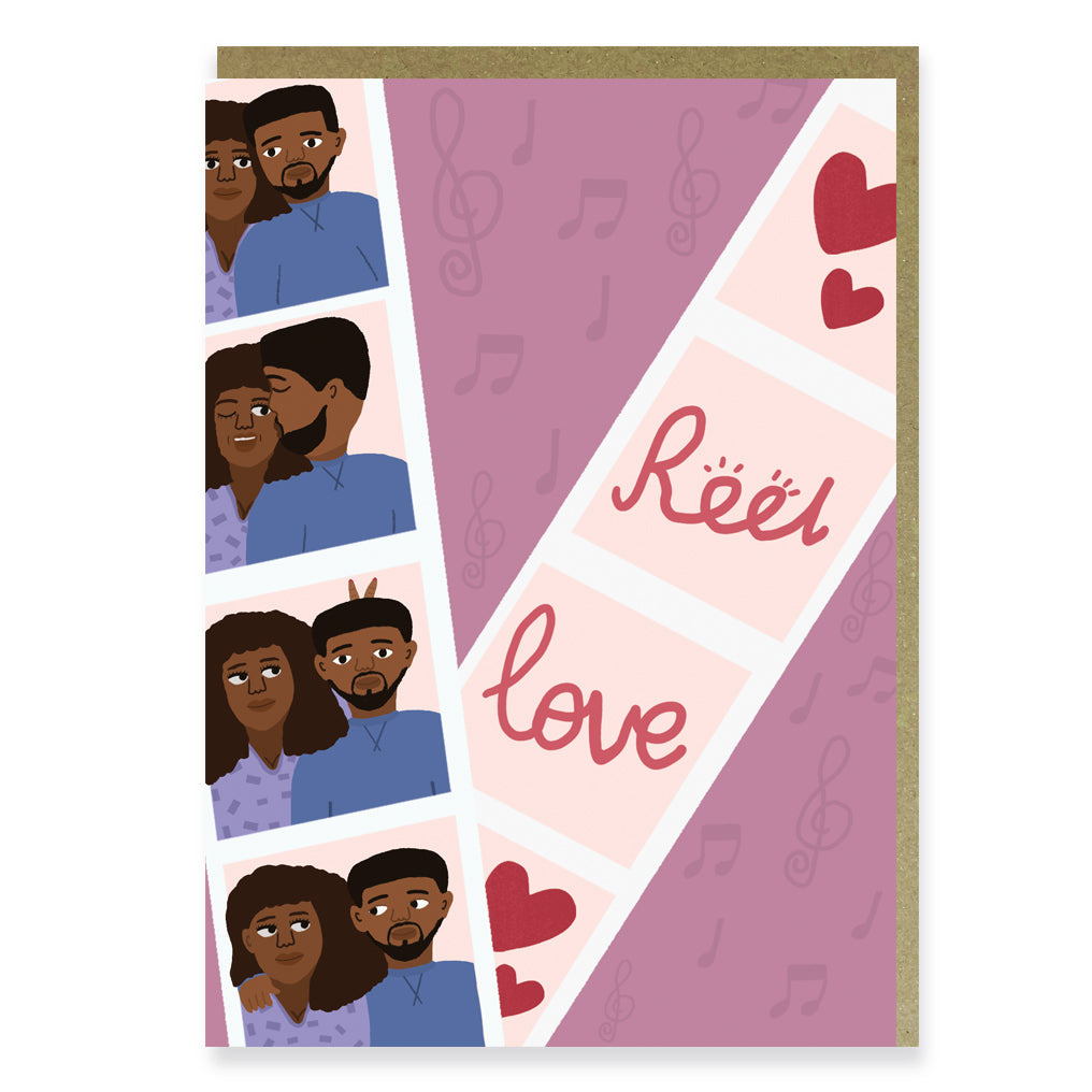 A Valentines Day card showing a loved up black couple in a photo booth