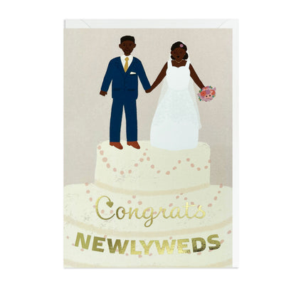 A Black Bride and Black Groom on top of a wedding cake. Black Greeting Card