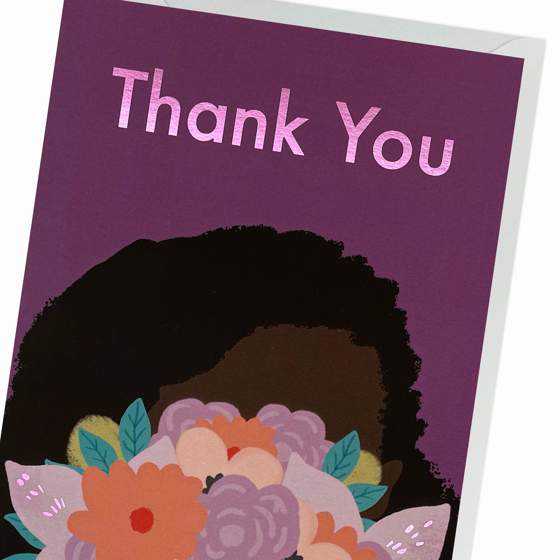 Close up of a Black Woman hiding her face behind a bouquet of beautiful colourful flowers. Black Greeting Card
