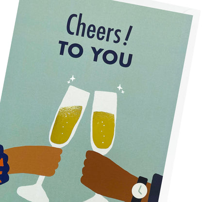 A close up of a couple holding champagne flutes. Black greeting card.