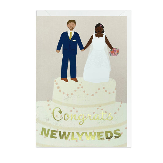 Black Bride and White Groom on top of a wedding cake. Black Greeting Card
